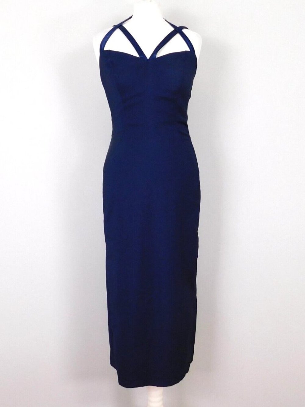 The vintage evening dress of the Bournshaw brand, in dark blue oceanic color